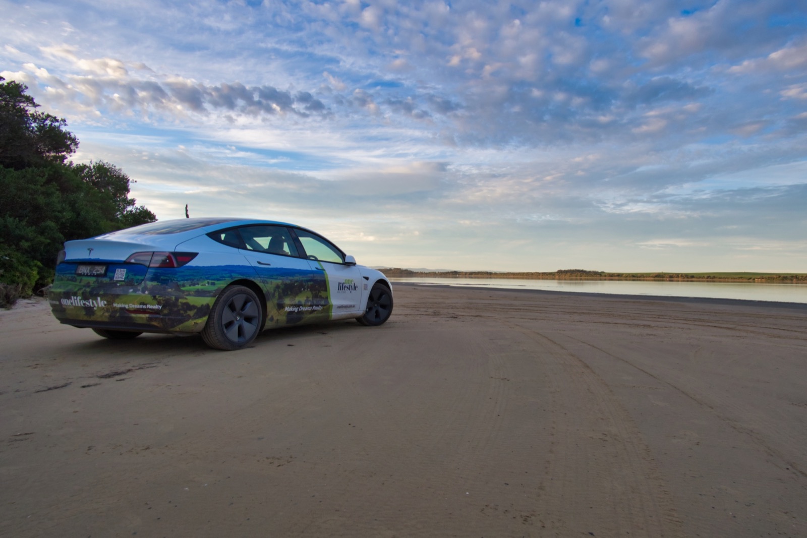 Branded vehicle positioned on the coast